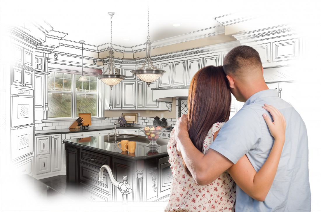 Photo of a couple looking at there kitchen 